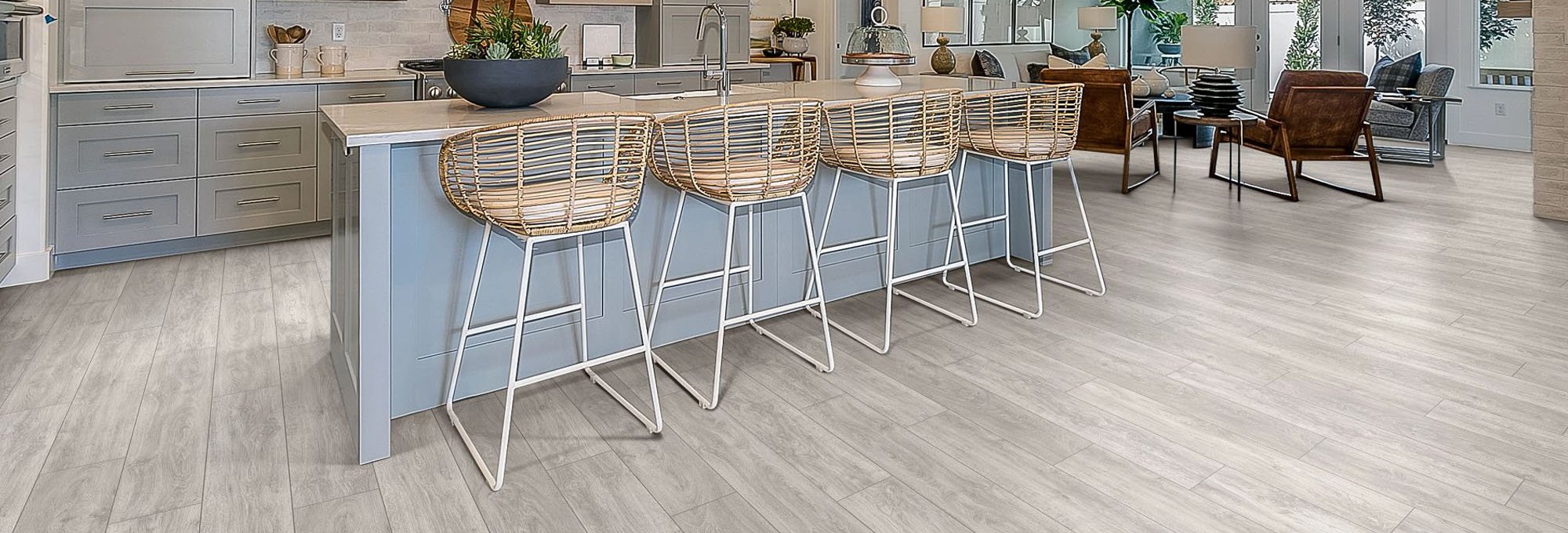 Kitchen dining area with wood-look laminate flooring from Carpet Villa in Grand Rapids, MI