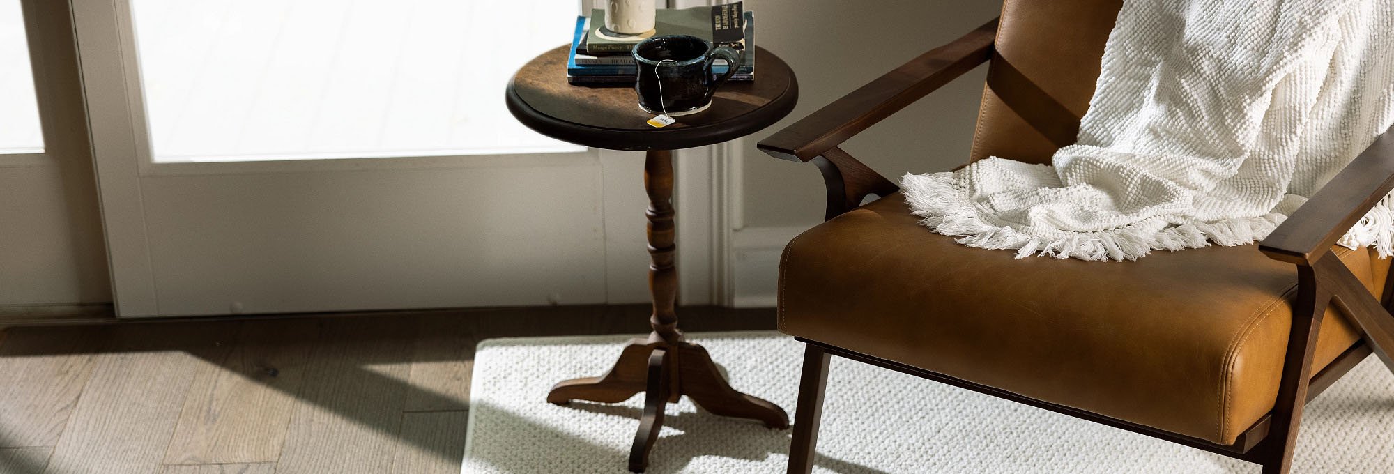 Brown armchair on a white area rug from Carpet Villa in Grand Rapids, MI