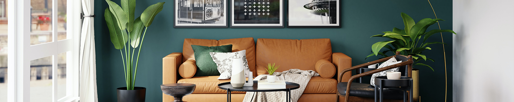 living room with orange couch and houseplants with pictures on the wall from Carpet Villa in Grand Rapids, MI